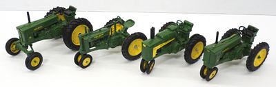 (4) Ertl John Deere tractors. (4) 1/16 scale Ertl John Deere tractors: G, 50, 70, and 630 - all 