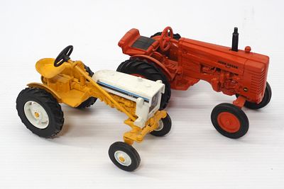(2) Ertl Tractors: International Cub and JD "MI". (2) 1/16 scale Ertl Tractors including 