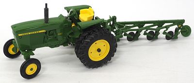 Ertl John Deere 3020 with 4-bottom plow. 1/16 scale Ertl John Deere 3020 with 4-bottom plow