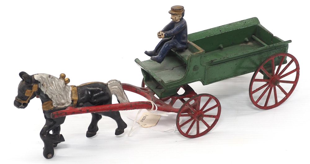 Lot 206: Kenton cast iron horse drawn wagon