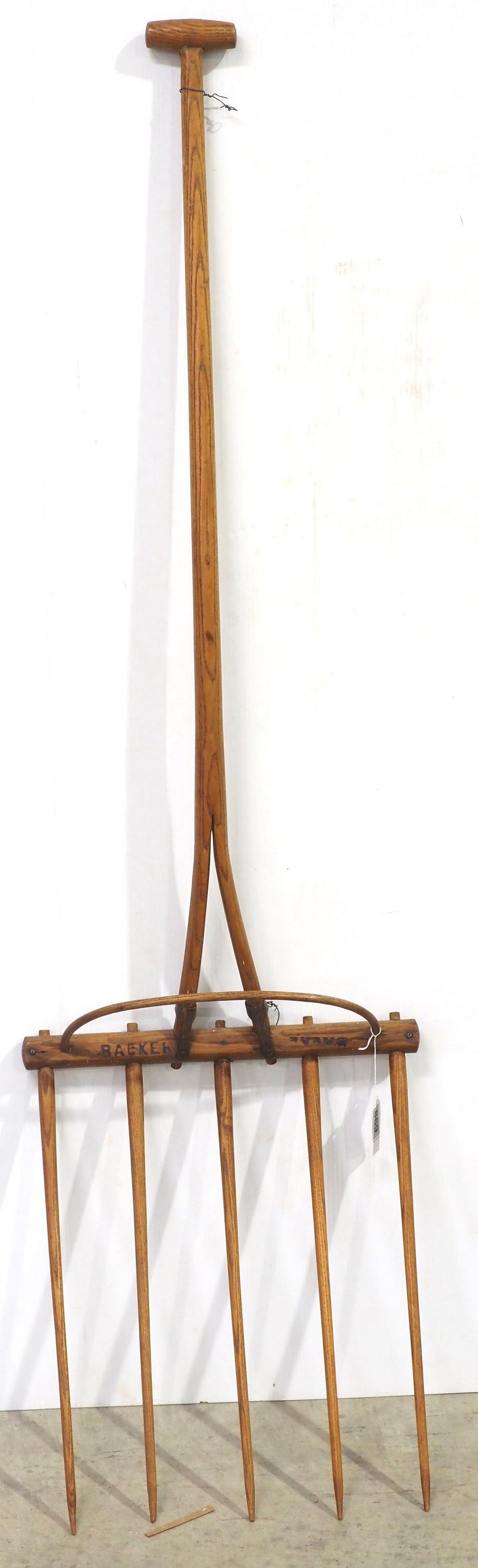 Lot 869: 63"L wooden primitive hay fork