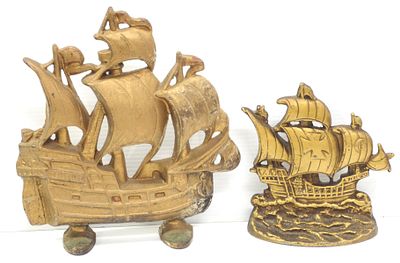 (2) Cast iron pirate ship doorstops, large one is marked Creation on back and measures 11"W x 12"H