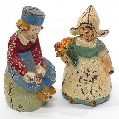 Cast iron Dutch boy and girl figural banks, boy is 5.5"H