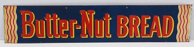 Butter-Nut Bread sign. 27.25"x5.5" SST embossed Butter-Nut Bread sign - Good Condition Good