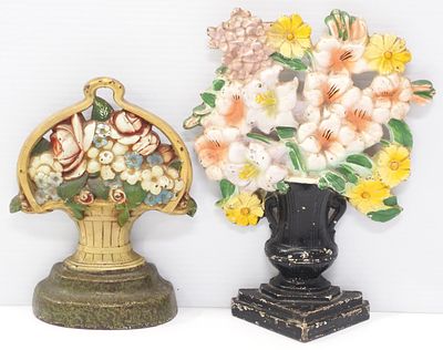 (2) Cast iron flower bouquet doorstops, largest measures 10"H