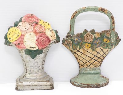 (2) Cast iron flower basket doorstops, basket with handle measures 10.5"H