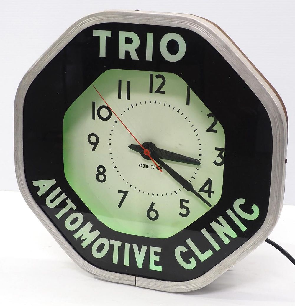 Lot 1165: Trio Automotive Clinic neon clock
