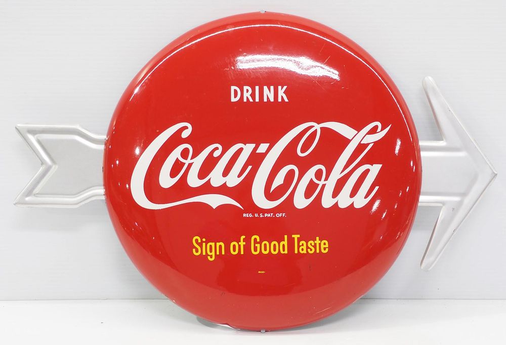 Lot 1198: Coca Cola button sign on arrow
