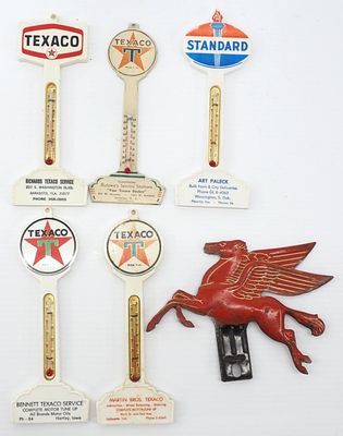 Advertising thermometers and license plate topper. Box lot including Pegasus license plate 