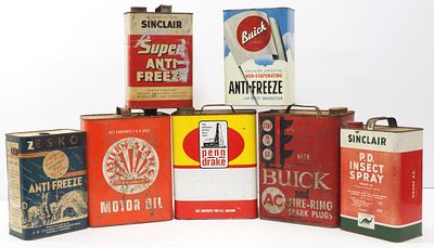 (7) Tin cans: Eastern States, Penn Drake, (2) Sinclair, (2) Buick, Zesko