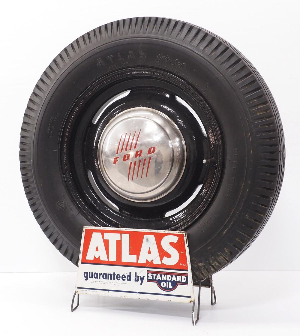 Lot 233: Atlas Tires display with tire