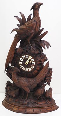 German Black Forest Carved Walnut Mantle Clock. Carved Black Forest Walnut Shelf Clock with 
