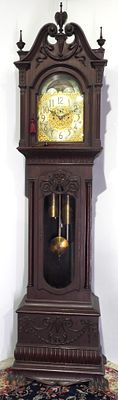Colonial Mfg. Co. Fancy Tall Case Grandfather Clock with Carved Broken Arch Crest, Claw Feet 