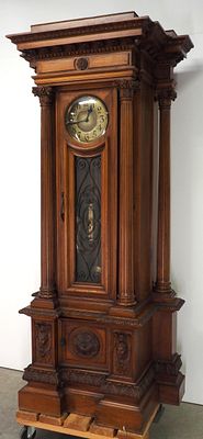 German Grandfather Clock with Fluted Corinthian Columns, Elaborate Carvings and Brass Dial 