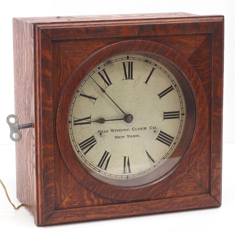 Lot 227: Quartersawn Oak Secondary Slave Wall Clock by Self Winding Clock Co.