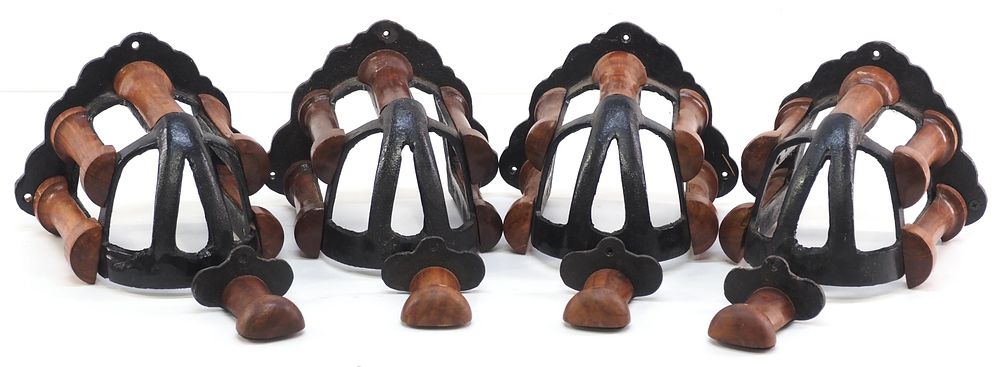 Lot 192: (8) Wood & cast iron, wall-mount bridle & rein racks
