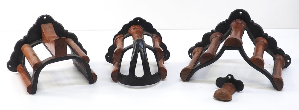 Lot 264: (4) Wood & cast iron, wall-mount harness racks