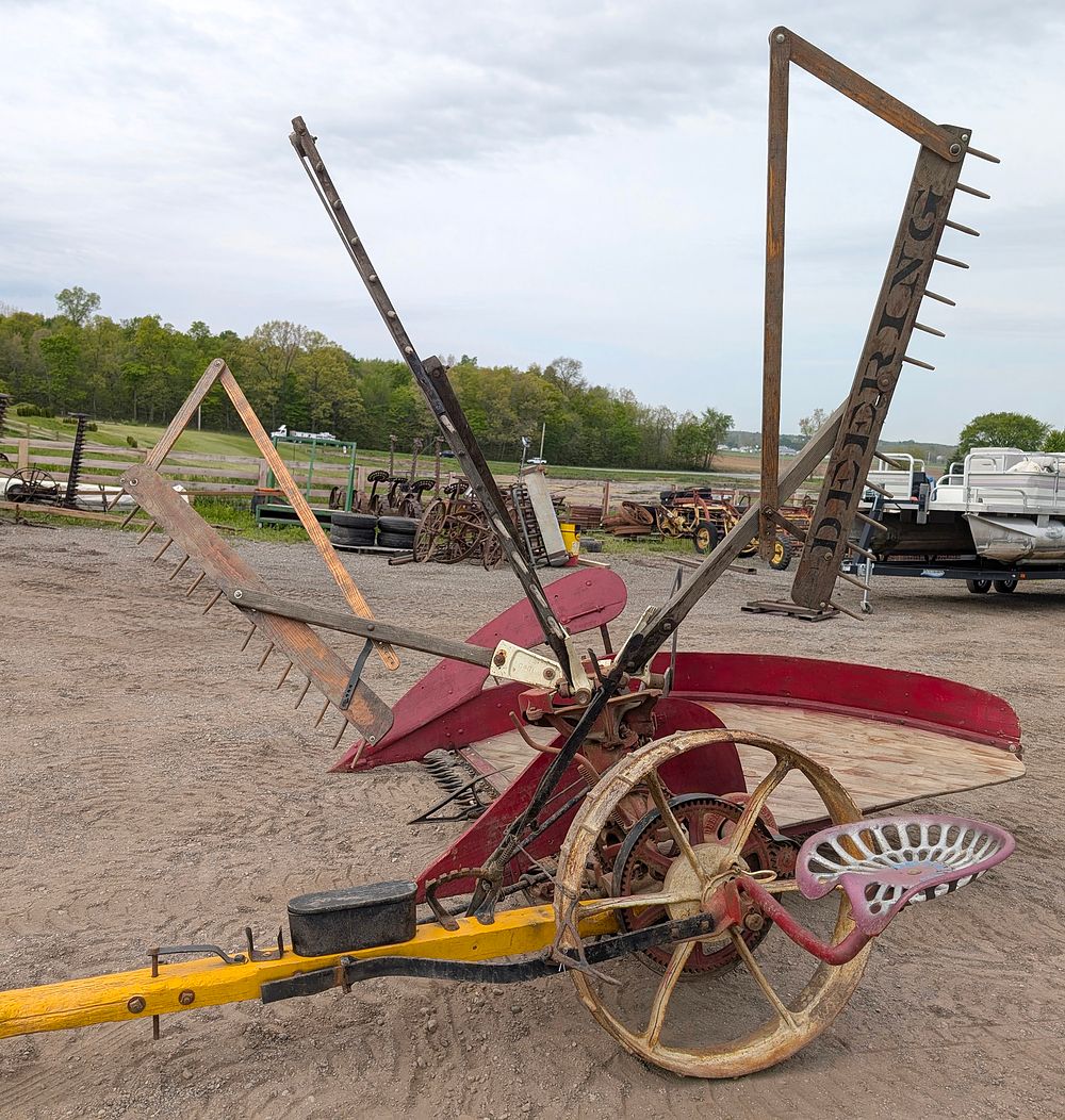 Lot 381: Early horse-drawn McCormick Deering grain reaper