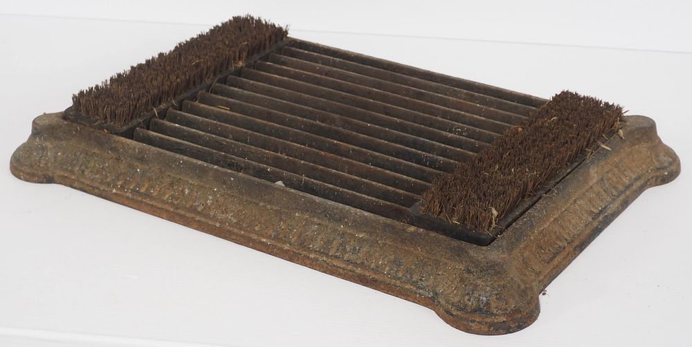 Lot 393: Cast iron floor model boot brush