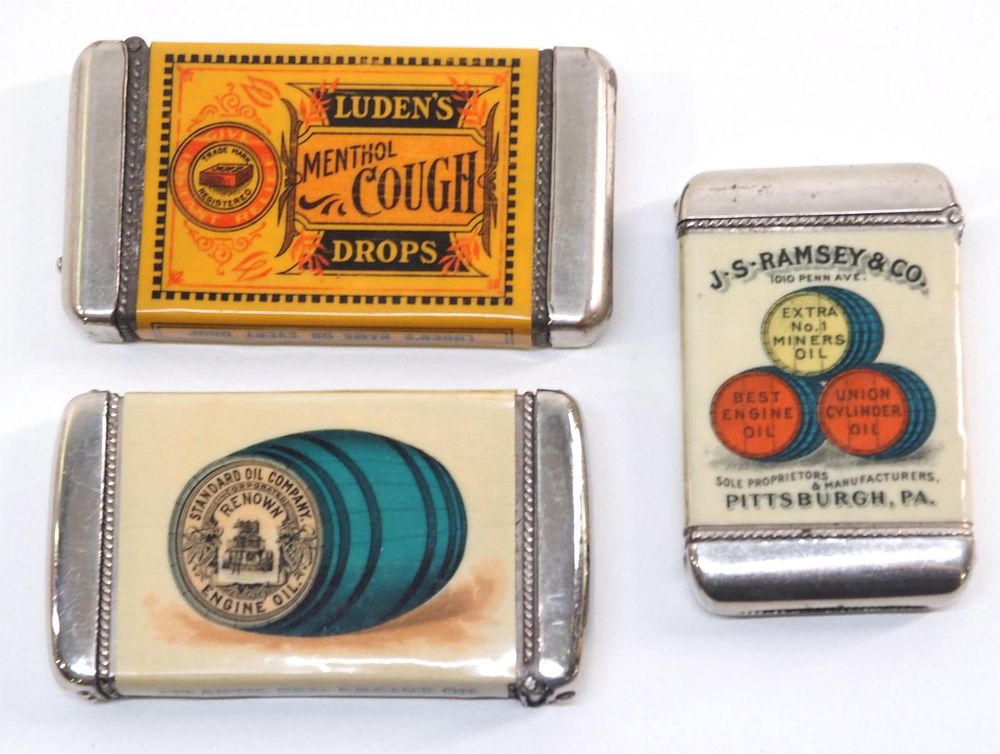 Lot 691: (3) Advertising pocket match safes