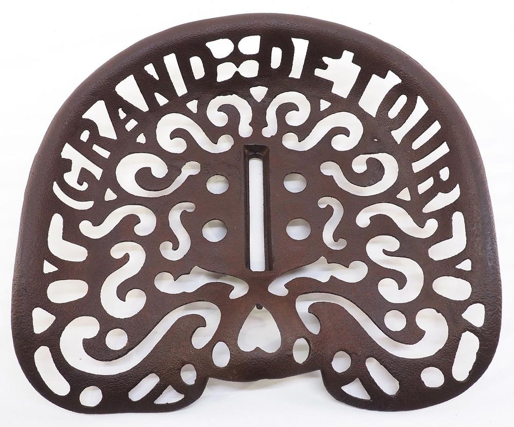 Lot 737: Grand Detour cast iron implement seat