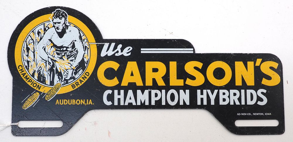 Lot 772: Carlson's Champion Hybrids tin license plate topper