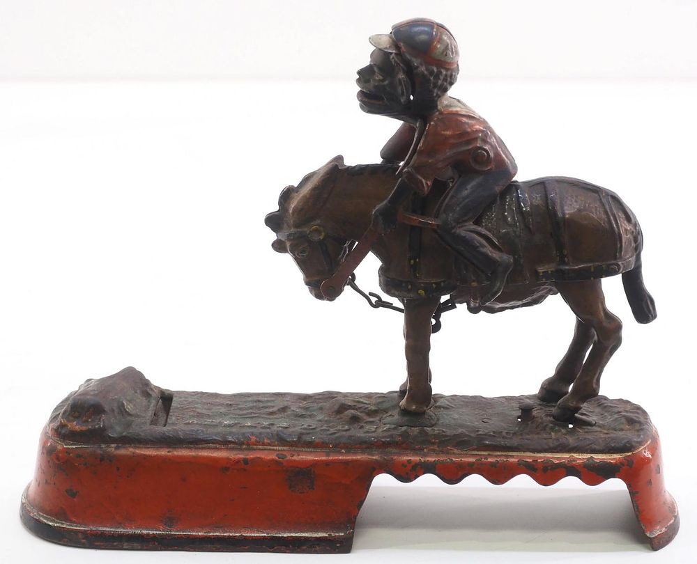 Lot 1292: Cast iron Always Did Spise A Mule mechanical bank