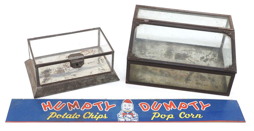 Lot 1433: (2) Glass country store display cases and chip sign