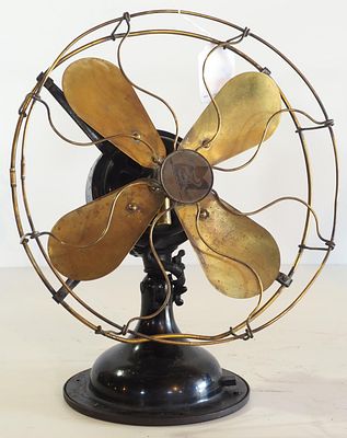 Robbins & Myers Co. Style No.2110 desk fan with 12"dia. brass blades, brass cage, black body