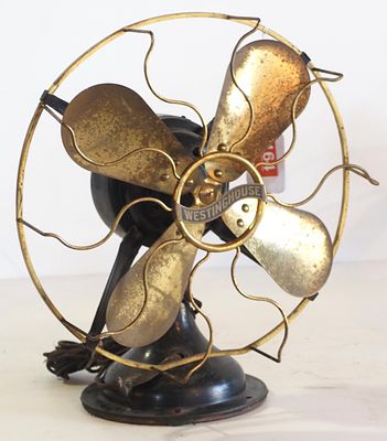 Westinghouse desk fan with 12"dia. brass blades, brass cage, black body