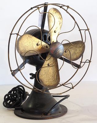 Peerless Style No.BB-1-11 desk fan with 12"dia. brass blades, brass cage, black body