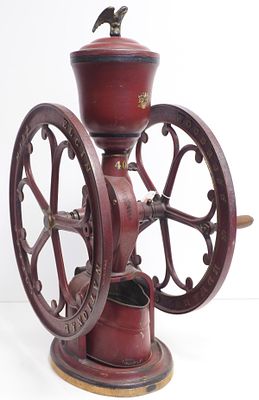 Elgin National No.40 coffee mill with original paint and eagle finial, wheel is 19"dia.