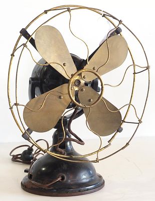 Robbins & Myers Co. desk fan with 12"dia. brass blades and brass cage, missing center logo