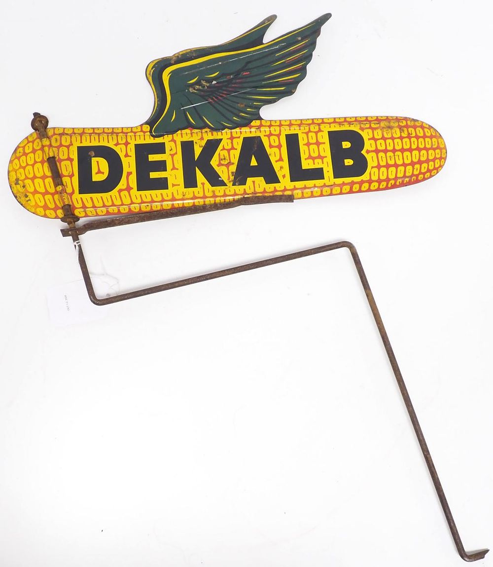Lot 602: DeKalb flying ear of corn fence spinner sign