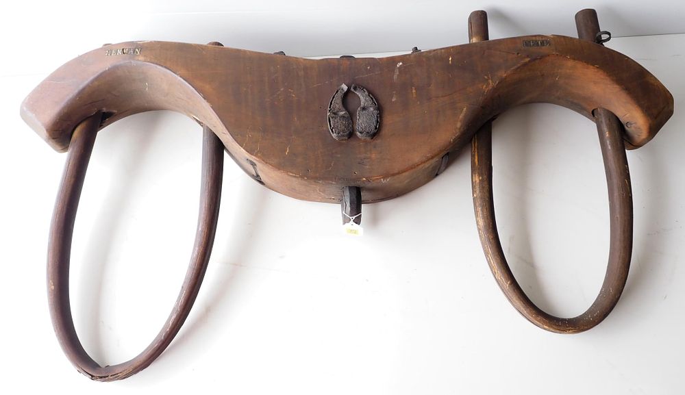 Lot 621: Wooden ox yoke with pair of ox shoes
