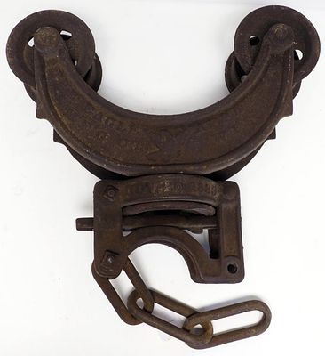 Eagle cast iron hay carrier - one wheel chipped Condition one wheel chipped