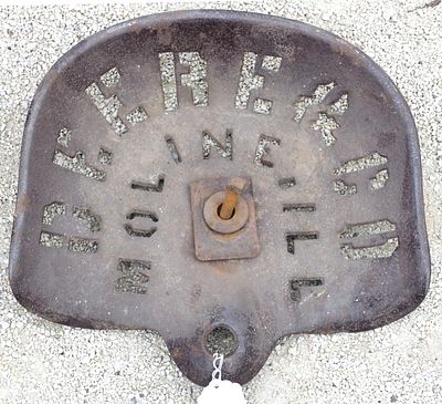 Deere & Co. Moline ILL cast iron seat