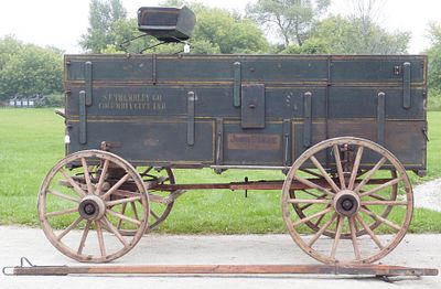 John Deere Ironclad triple board box wagon with tongue, stenciling for S.F. Trembley Co 