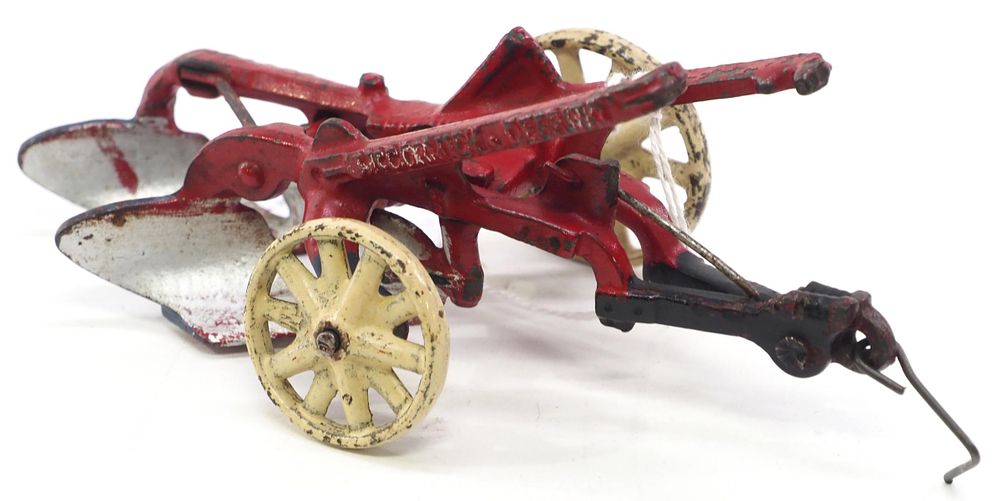 Lot 174: Arcade #238 McCormick-Deering cast iron plow
