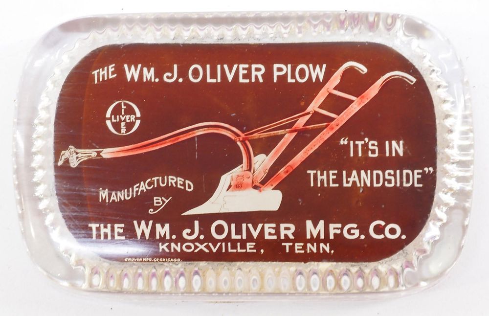 Lot 197: Wm. J. Oliver Plow paperweight