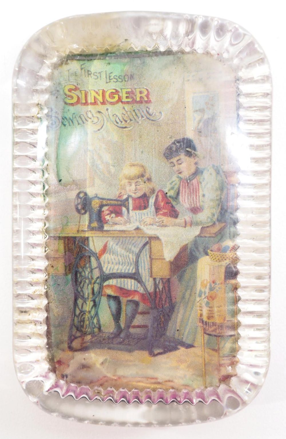 Lot 198: Singer Sewing Machine paperweight