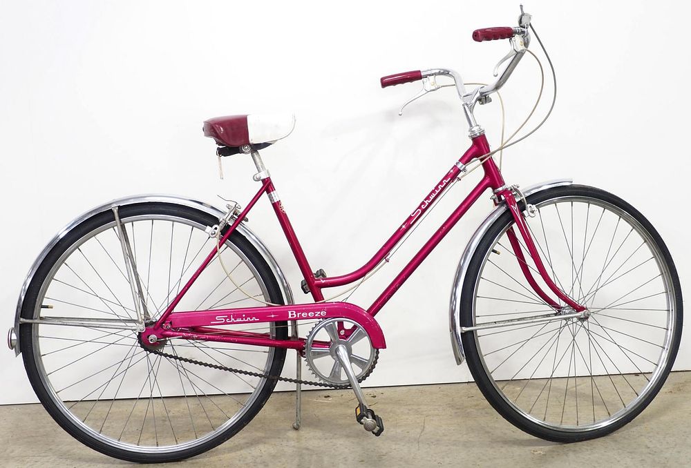 Lot 207: Original Schwinn red girls bicycle