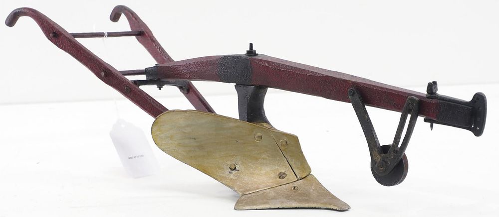 Lot 242: Early model walk-behind plow