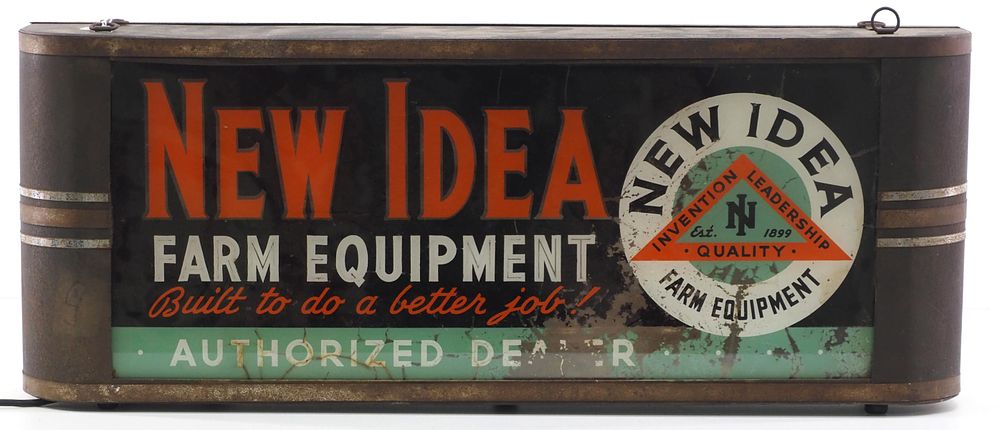 Lot 246: New Idea Farm Equipment lighted sign