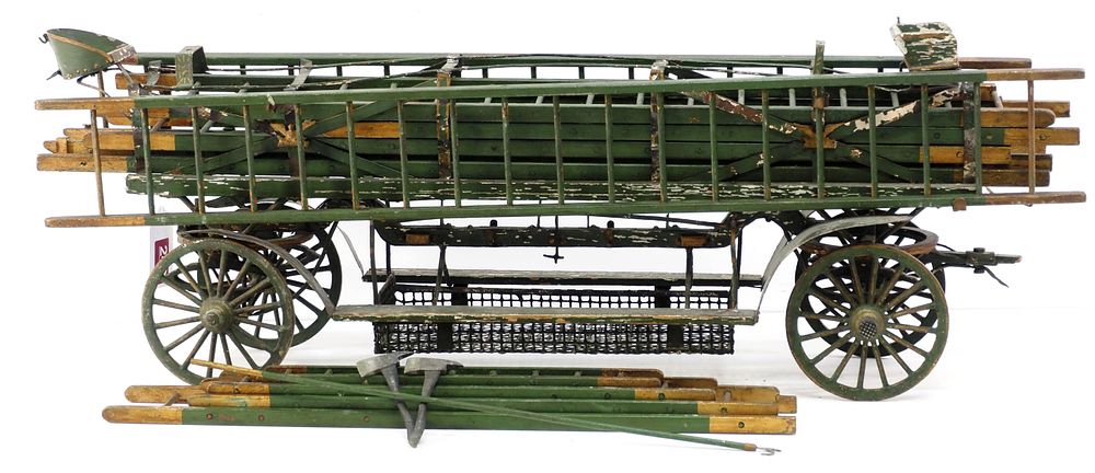 Lot 249: Early horse-drawn fire ladder wagon