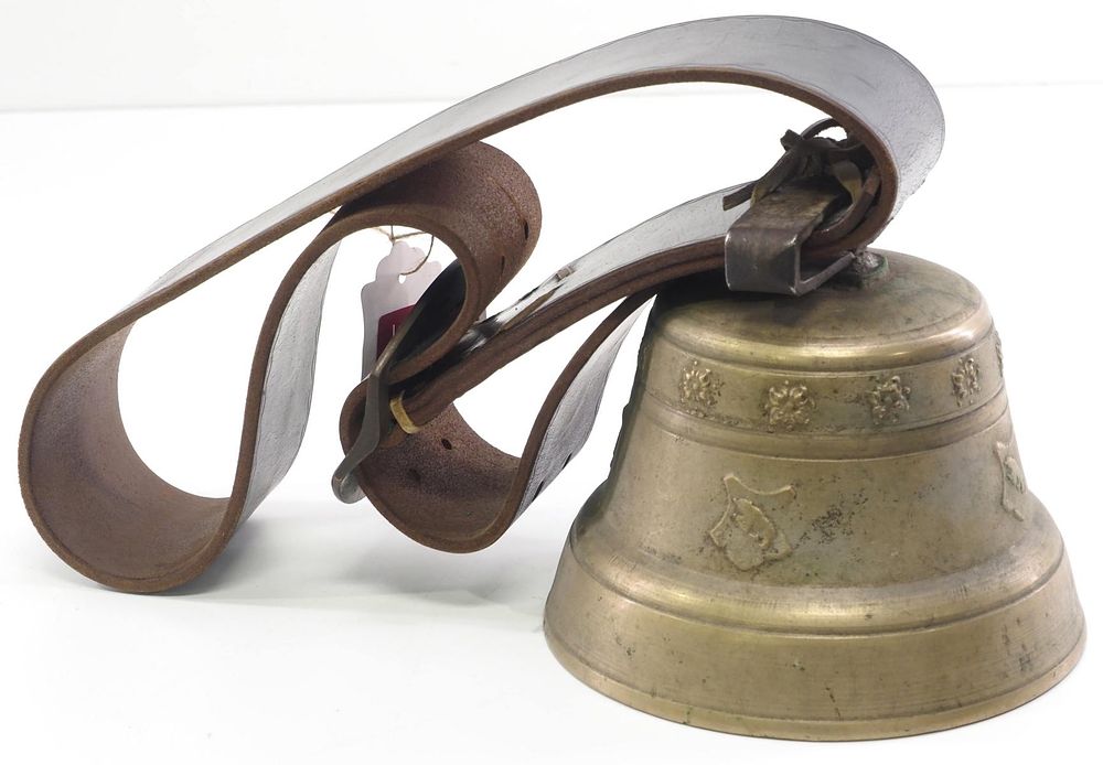 Lot 360: Brass cowbell on wide leather strap