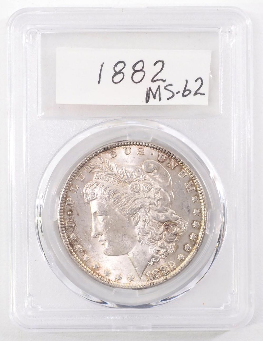 Lot 382: 1882 Morgan silver dollar, MS-62