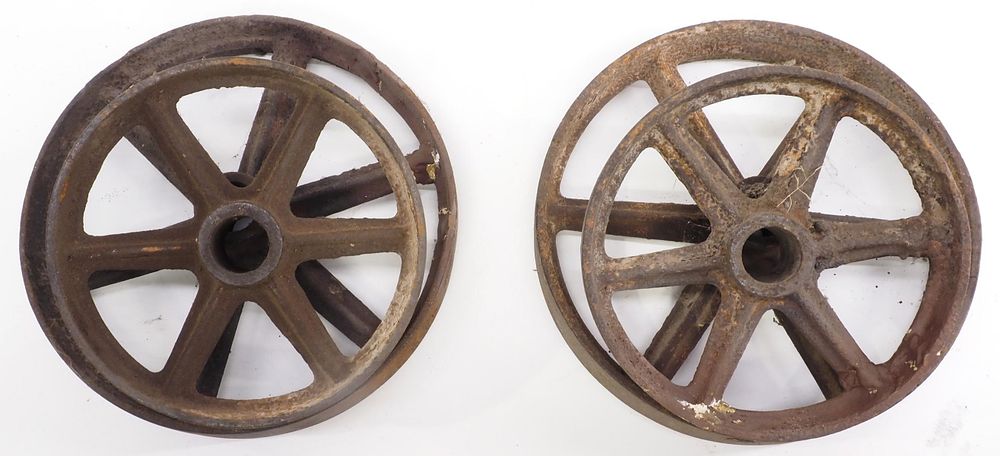 Lot 446: (4) Cast iron wheels
