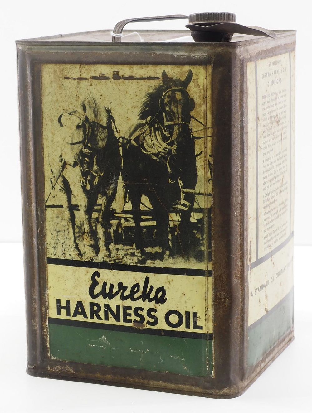 Lot 621: 5-gallon Eureka Harness Oil tin