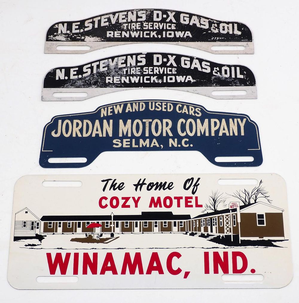 Lot 643: (4) Tin license plate toppers